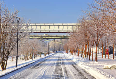 Novosibirsk, Siberia, Russia, 02.10.2021: Michael's embankment in winter. Pedestrian alley in the...