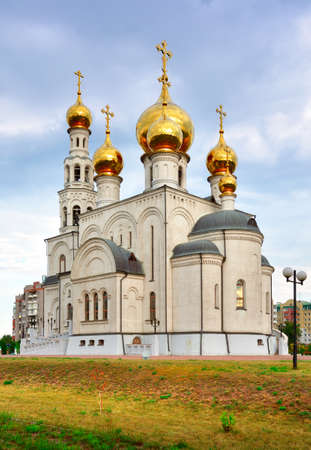 A tall Orthodox church with golden domes in the Russian architectural style. Khakassia, Siberia, Russiaの写真素材