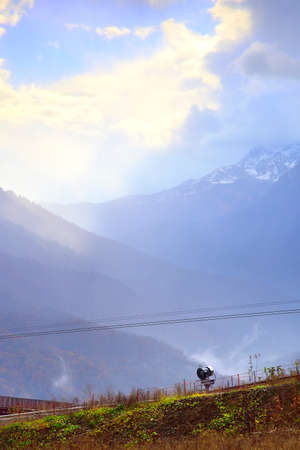Light through the clouds over the Caucasus mountains. Rosa Khutor, Sochi, Russia, 2021