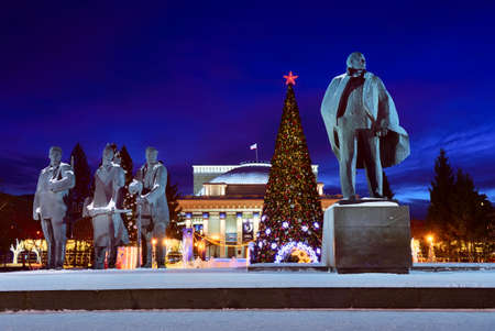 Novosibirsk, Siberia, Russia, 01.16.2022. Lenin Square on a winter night. Sculptures of Lenin, a Worker, a Soldier and a Peasant on the background of Christmas decorations and the opera houseのeditorial素材