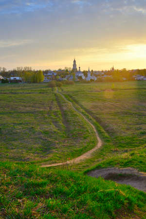 Dawn at the old town. The domes of churches and the bell tower on the horizon. Suzdal, Russia, 2022の写真素材