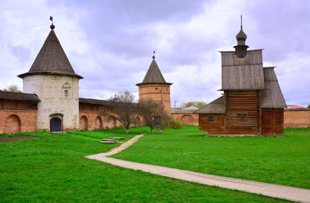 Towers of the old Kremlin. The wooden Church of St. George in the courtyard of the fortress....