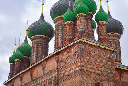The Church of John the Baptist. Domes of a brick church with colored tiles, a monument of Russian architecture of the XVII century. Yaroslavl, Russia, 2022の写真素材