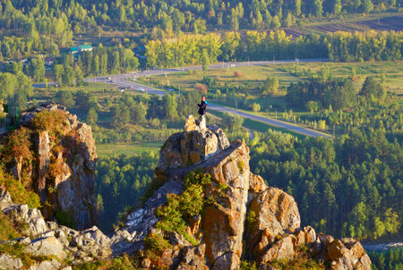Altai, Siberia, Russia, 09/18/2022. Ayia Nature Park in the mountains. The top of the rock of Demons Finger on an autumn evening over the Katun Valleyのeditorial素材
