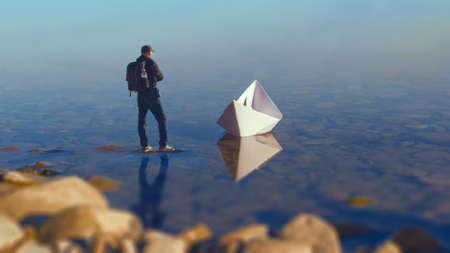 A man with a paper boat.