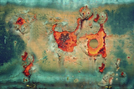 An abstract picture of chickens on a corroded iron plate 