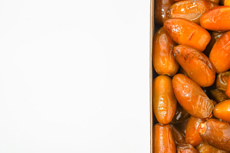 Fresh ripe yellow dates, fresh dates ruthob isolated on white backgroundの写真素材