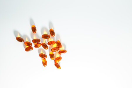 Soft gel, Close up of oil filled capsules, suitable for presenting food supplements : fish oil, omega 3, omega 6, omega 9, vitamin A, vitamin D, vitamin D3, vitamin E, evening primrose oil,の写真素材