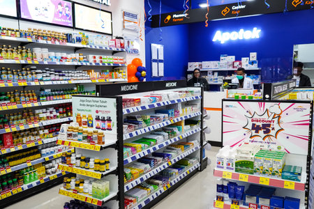 Jakarta, Indonesia, february 16, 2022: Kimia Farma Pharmacy is a new concept, providing pharmaceutical solutions and health services in the form of selling prescription drugs, non prescription drugs, traditional medicines, etc.のeditorial素材