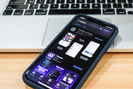 Jakarta, Indonesia, July 12, 2023: threads app logo is visible on the screen. The new application from Meta Platforms is a competitor to Twitter.のeditorial素材