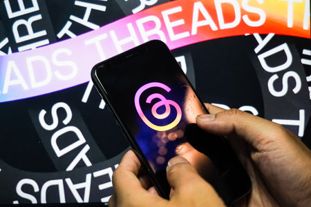 Jakarta, Indonesia, July 12, 2023: threads app logo is visible on the screen. The new application from Meta Platforms is a competitor to Twitter.のeditorial素材