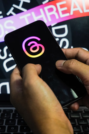 Jakarta, Indonesia, July 12, 2023: threads app logo is visible on the screen. The new application from Meta Platforms is a competitor to Twitter.のeditorial素材