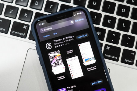 Jakarta, Indonesia, July 12, 2023: threads app logo is visible on the screen. The new application from Meta Platforms is a competitor to Twitter.のeditorial素材