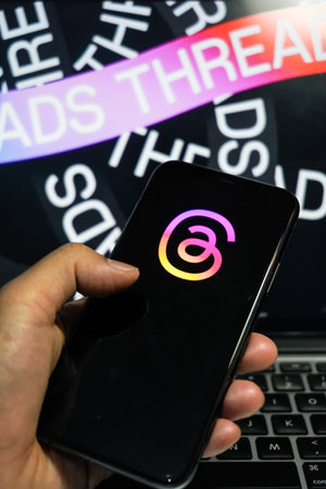 Jakarta, Indonesia, July 12, 2023: threads app logo is visible on the screen. The new application from Meta Platforms is a competitor to Twitter.のeditorial素材