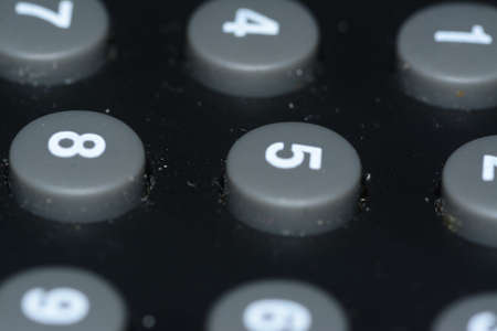 Close up of the numbers on a remote control