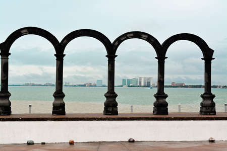 Los Arcos arches Amphitheater near Pacific ocean in the malecon of Puerto Vallarta, Mexicoの写真素材