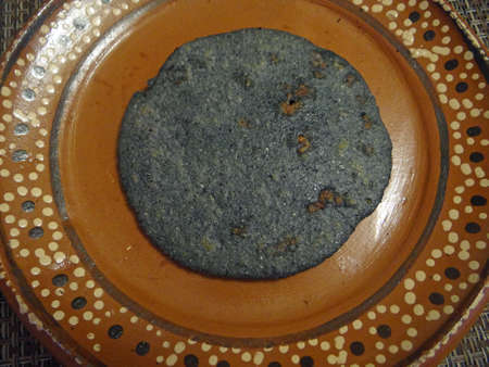 Mexican gordita made with corn and filled with porkの写真素材