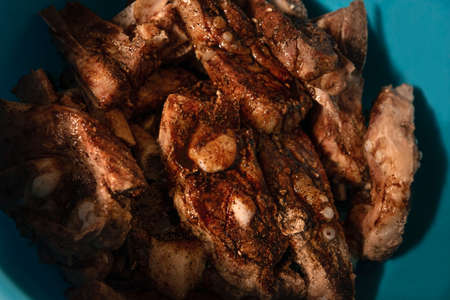 closeup of roasted pork ribs with barbecue sauce and caramelized with honey. Tasty homemade snack or small business owの写真素材