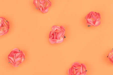 orange background with orange flowers embossed and textured