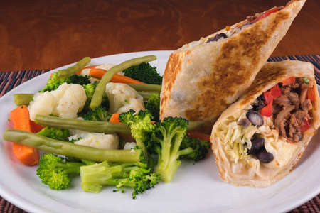 DELICIOUS VEGETARIAN FOOD WITH VEGETABLES, TORTILLAS, CARROT, CUCUMBERS, TOMATO, HEALTHY FOOD, WITHOUT MEAT, SEEDS CROQUETTES, BROCCOLIの写真素材