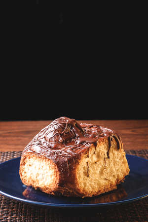 delicious homemade sponge cake with chocolate placed on a white plate ideal for dessertの写真素材