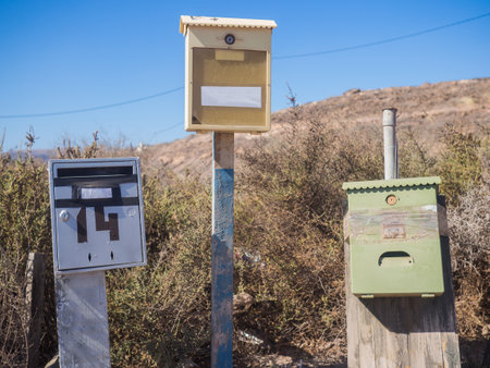 Some vintage various letterboxes in the countrysideの写真素材