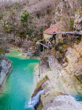 Old water mill on a creekの写真素材