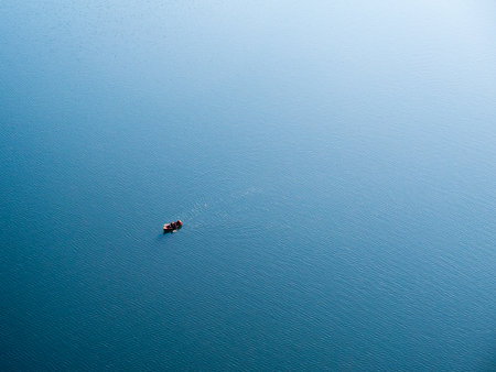Small boat on a lakeの写真素材