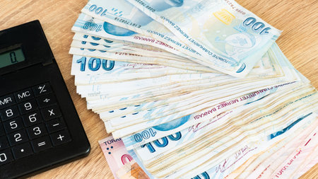 Turkish lira banknotes and calculator. Accounting concept