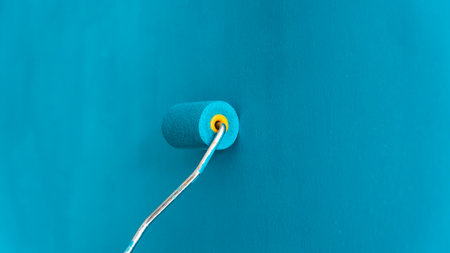 Painting wall. diy concept. Home interior improvement. Renovating house. Do it yourself concept. Selective focus includedの写真素材