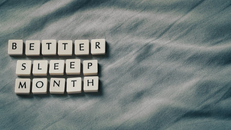 Better sleep month. Better sleep month words on soft bed. High angle view. Selective focus included. Presentation template.の写真素材