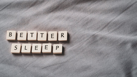 Sleep concept. Better sleep words on bed. Sleep health concept. High angle view. Copy space for...