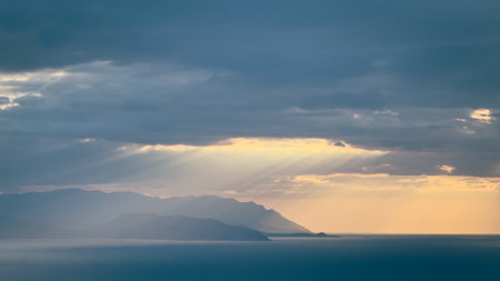 Sunset sky. Dramatic sky view. Sunlight over the seaの写真素材