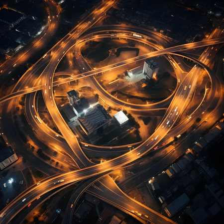 Aerial View of Illuminated Highway Interchange at Nightの素材