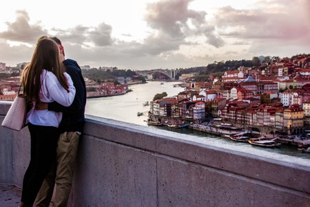 ROMANTIC PHOTO OF A COUPLE KISSING IN FRONT OF PORTO VIEW ON VALENTINEの写真素材