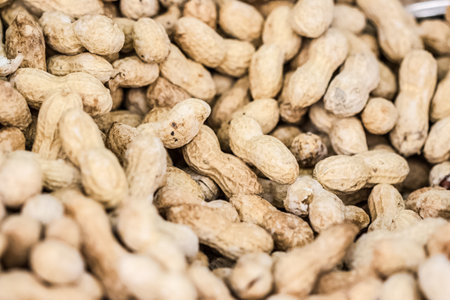 capture of raw peanuts pile at market