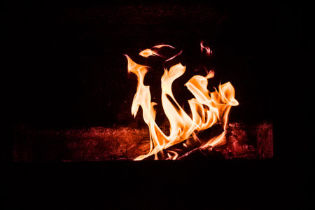 BREATH HOLDING CAPTURE OF A BURNING WOOD FIREの写真素材