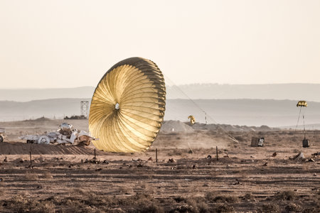 capture of parachuted aid in the battlefieldの写真素材