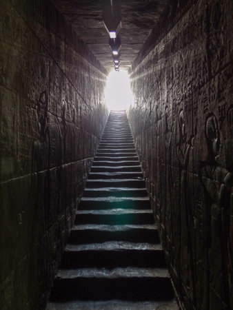 Staircase with decorated walls in the Temple of Edfu, Egypt