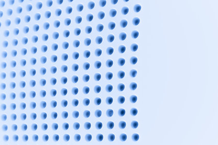 Abstract light colored surface with holes built in a row for creativity, wallpapers and backgrounds.の写真素材