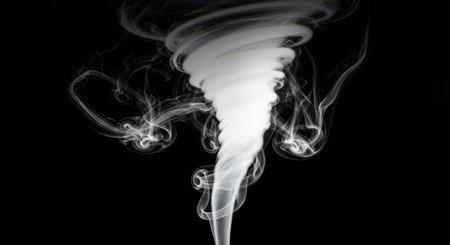 White smoke on black background. Abstract white smoke isolated on black backgroundの素材