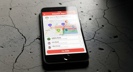 A modern smartphone lies on a rough, cracked concrete background. The screen is illuminated, showing a map-based application, possibly for ride-hailing or navigation.の素材