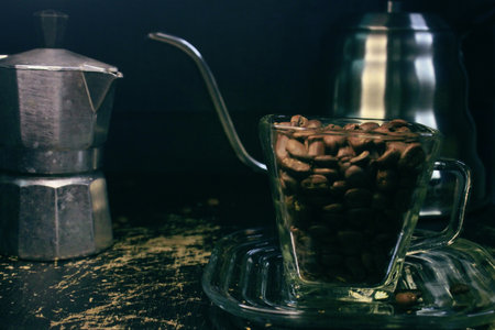 manual tools for processing a cup of coffee, ranging from coffee cups, mocha pots to make espresso, kettle with goose neck to pour water stably, manual coffee grinder with various sizes of powder.の写真素材