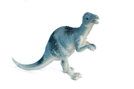 plastic dinosaur Megalosaurus toy with isolated white background, commonly used as a tool to...