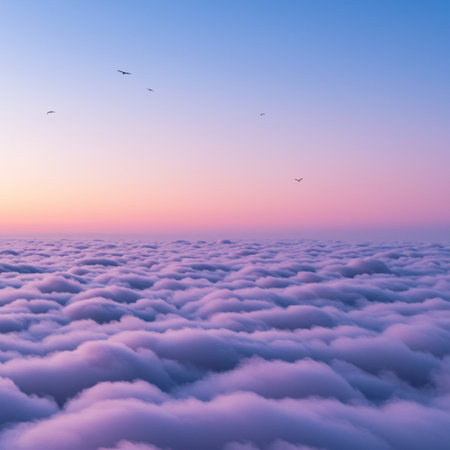 Flying above the clouds at sunset. Aerial view of white fluffy clouds in the blue sky. View from above.の素材
