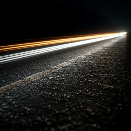 Car light trails in the tunnel. Long exposure photo taken in a forest.の素材