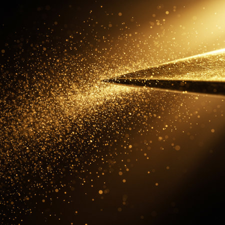 Abstract gold glittering background. Golden sparkles on a black background.の素材