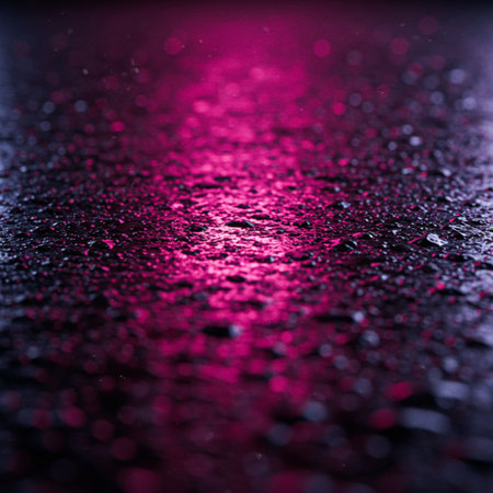 Rain drops on a black metal surface. Abstract bokeh background.の素材