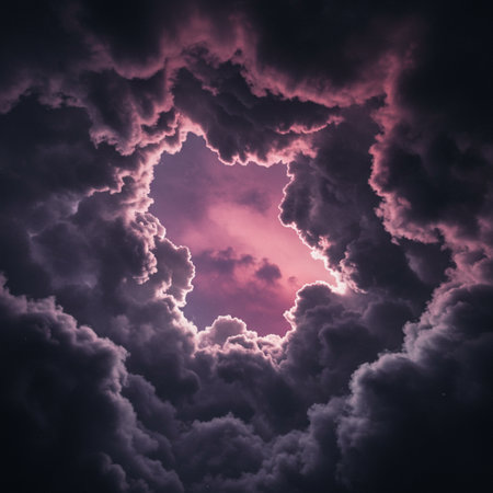 Beautiful purple clouds in the form of heart on dark sky backgroundの素材