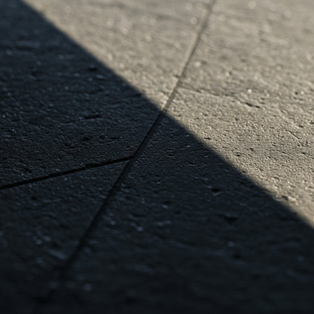 The shadow of the sun on the surface of the pavement. Abstract backgroundの素材
